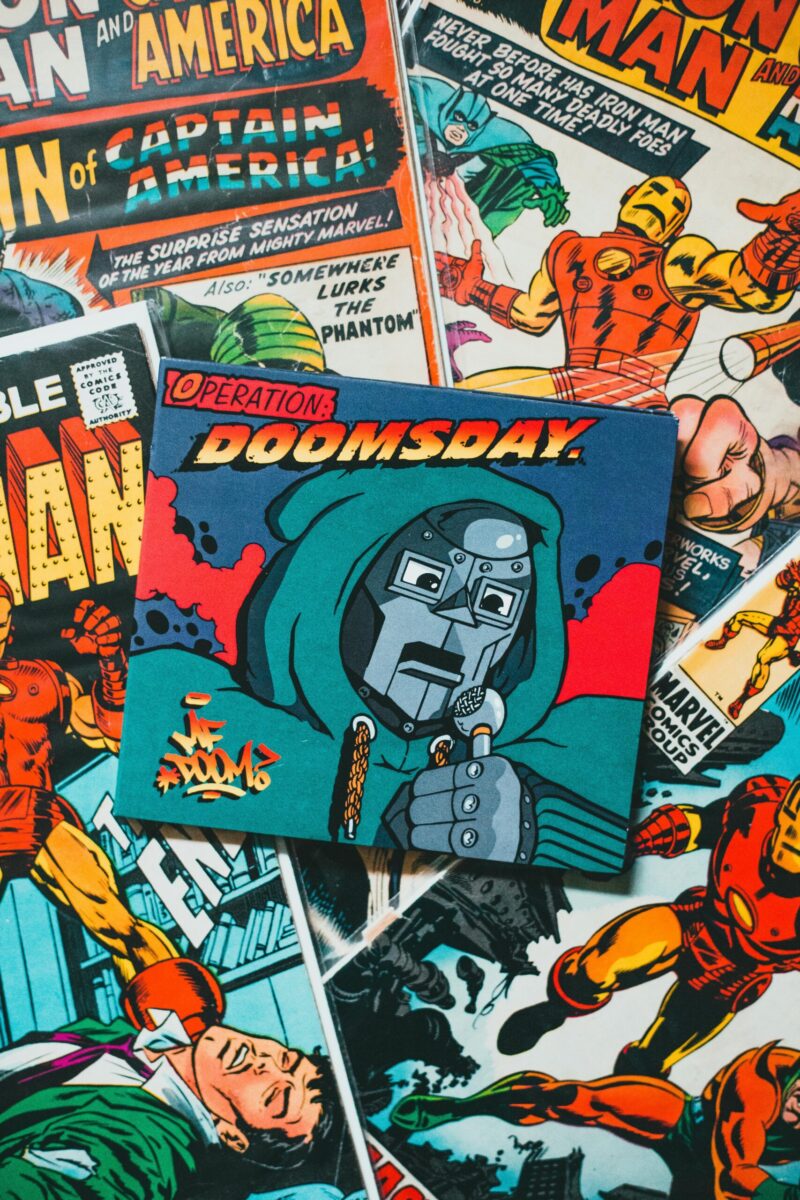 Collection of colorful vintage comic book covers showcasing famous heroes and villains.